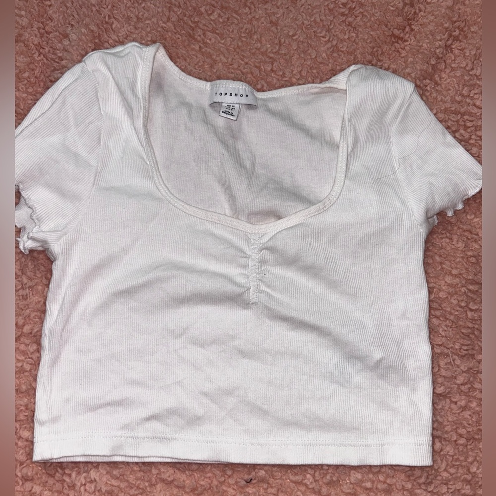 White ruffled sleeve top